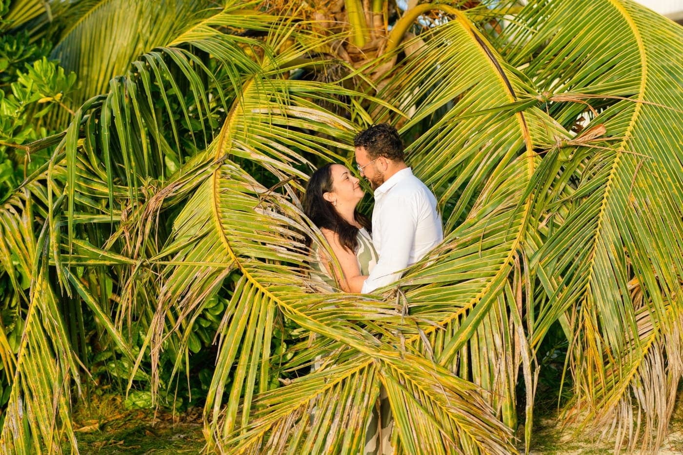 Couple photo session among palm trees at a Mauritius location
