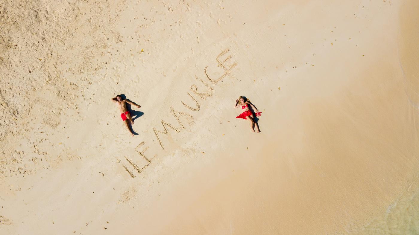 Aerial beach photo tour two people sand mauritius