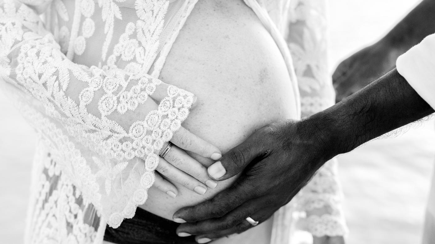 Black and white maternity couple baby bump detail mauritius