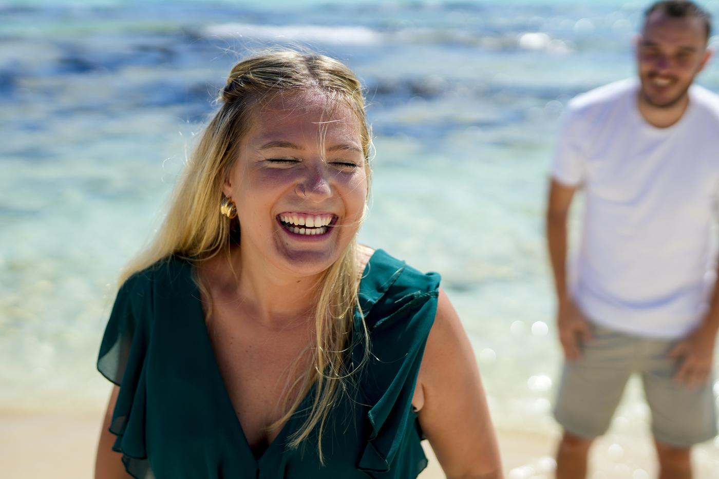 Candid couple portrait beach laughing mauritius