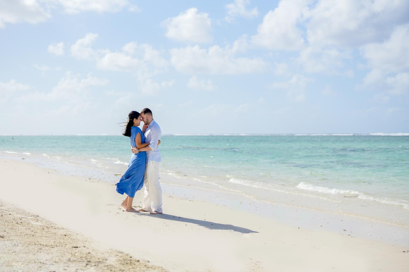 Couple embracing white sand beach mauritius