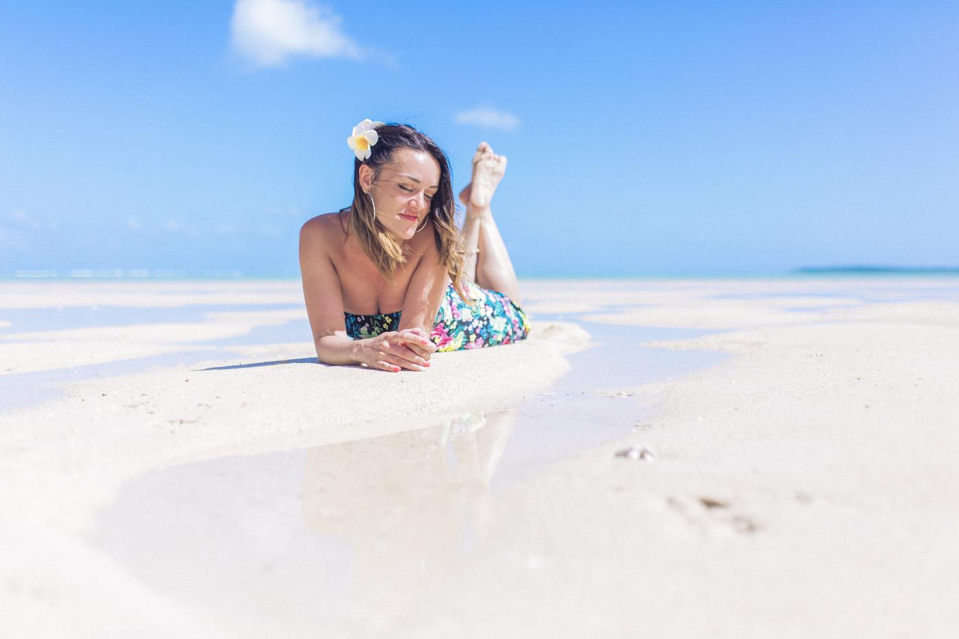 Woman relaxing shallow beach water mauritius